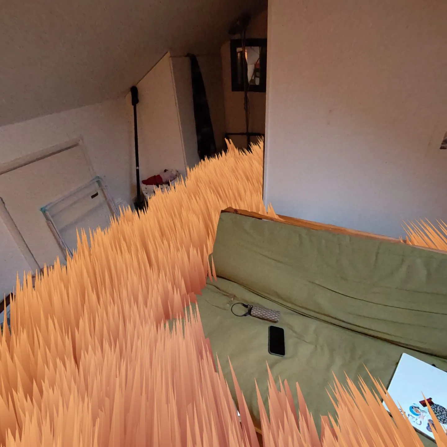 Virtual orange grass covering the floor of a real room